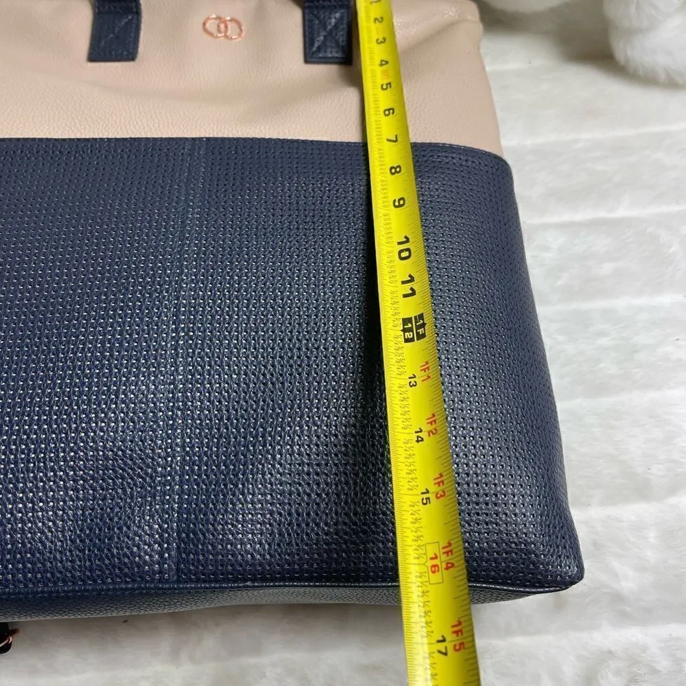 Caboodle Navy blue and beige computer backpack with rose gold hardwares